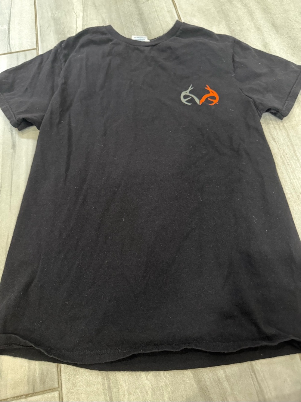 Delta Black Short-Sleeve Men’s Logo Tee with Gray and Orange Accent